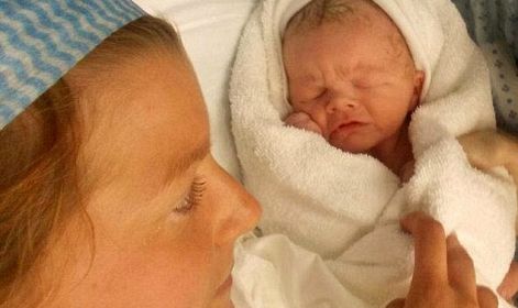 Mother told to abort her baby at 20 weeks over fears he would 'be paralysed and have no quality of life' gives birth a healthy son